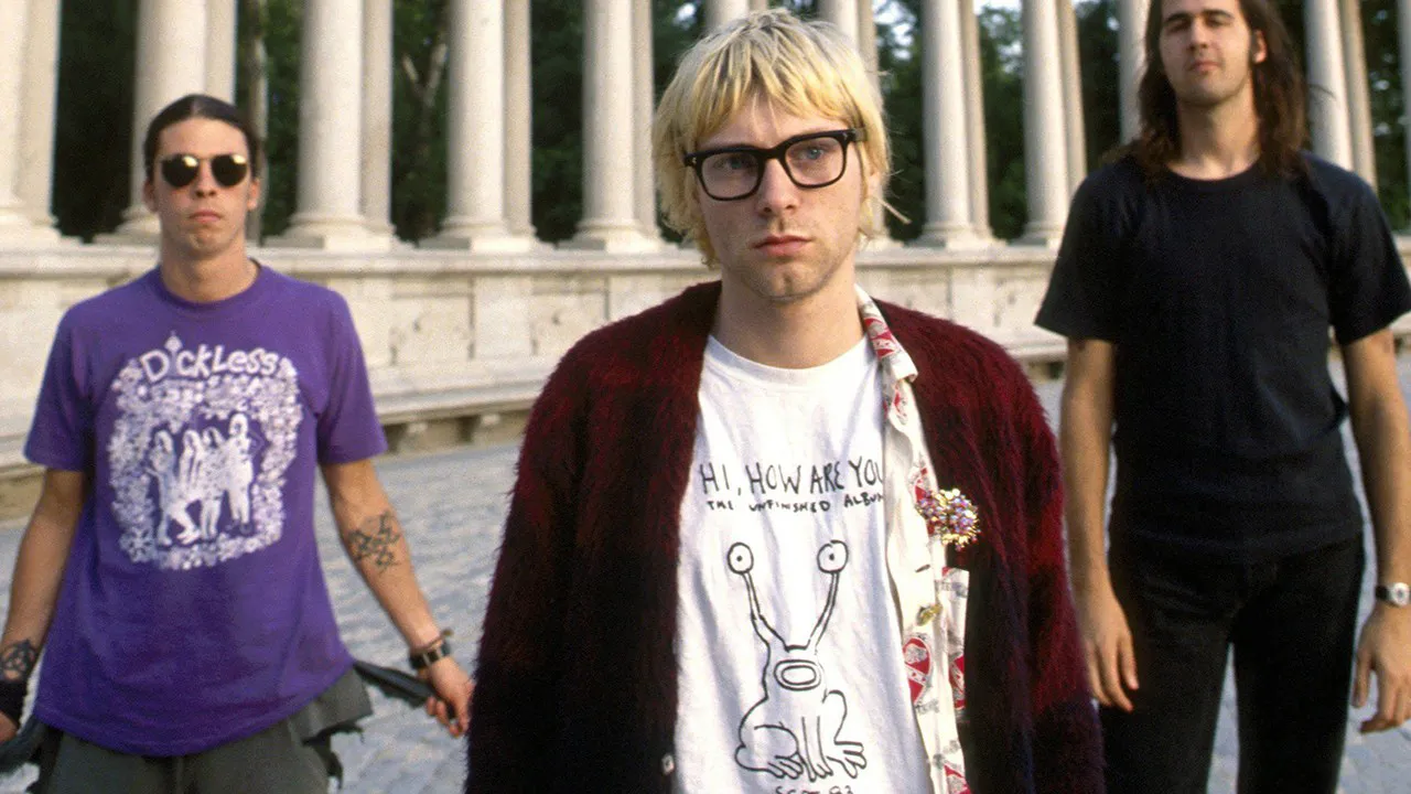 Kurt Cobain wearing Hi How Are You t-shirt